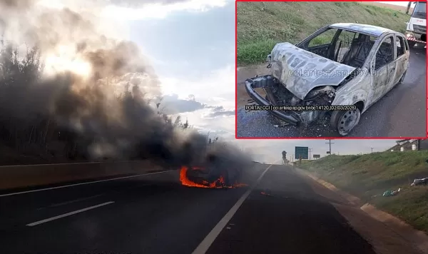 Carro pega fogo após acidente. Motorista de caminhão envolvido foge do local